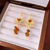 Aretes Asimétricos de Flor con Gota de Perla de Aguja Plateada, Simples, Modernos, Aretes de Alta Gama, Aretes Exquisitos y Versátiles, Estilo de Nicho