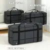 Bolsa de mudanza gruesa, impermeable, de gran capacidad, para guardar equipaje, con acabado a rayas.