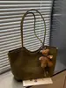 Bolso Tote Retro para Mujer 2026 Nueva Moda Textura de Moda Nicho para el Trabajo Cesta de Compras Tejida de Mano Bolso de Hombro