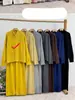 Nuevo Traje Casual de Dos Piezas para Mujer 2025 Otoño e Invierno: Cárdigan de Punto Trenzado con Doble Cremallera + Pantalones de Pierna Ancha