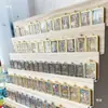 Sala de transmisión en vivo de comercio electrónico Soporte escalonado Estante de exhibición de varias capas para joyería Esmalte de uñas Aceite esencial Estante de almacenamiento para encendedores Thangka