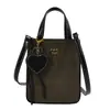 El bolso pequeño de moda de este año para mujer, perfecto para la primavera, versátil y elegante, nueva colección 2026, bolso cruzado sencillo, bolso tipo cubo tote estilo coreano