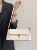 Bolsa de Mão de Nicho Francês Feminina 2025 Nova Moda Retro Bolsa de Ombro Bolsa Bagel Bolsa de Ombro Média Antiga