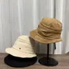 Diseño Otoño e Invierno Estilo Temperamento Lujo Ligero Sombrero de Pescador Plisado Nuevo Moda para Mujer Adelgazante Facial Informal Ala Suave Sombrero de Cubo Color Café