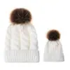 Comercio exterior europeo y americano en otoño e invierno gorro tejido de punto de bola retorcida cálido para mujer padre-hijo imitación bola de pelo de mapache gorro de lana