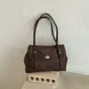 Bolso de Axila de Cuero con Cera de Aceite de Alto Valor Estilo Coreano para Mujer Invierno 2026 Nuevo Bolso Almohada Retro Bolso de Hombro Único para Viaje Bolso Baguette