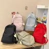 Mochila bordada de nicho da moda para alunos do ensino fundamental II e médio, alto valor estético, design simples, grande capacidade, mochila de viagem feminina