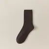 Nuevos calcetines de otoño e invierno para mujer, calcetines de color liso hasta la mitad de la pantorrilla, calcetines largos versátiles de color liso, calcetines acanalados de algodón ligeramente compresivos para mujer