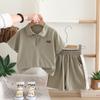 Conjunto de dos piezas de manga corta de verano para niños y niñas, traje de moda para niños, nuevo polo de verano de color sólido para niños.