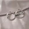Suministro Transfronterizo Más Vendidos Pendientes de Latón Huecos Simples Europeos y Americanos Pendientes de Aro Gruesos y Delgados Pendientes Elegantes en Forma de C con un Toque de Alta Gama para Mujeres