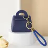 Bolsa para monedas pequeña de color caramelo linda estilo coreano, monedero, llavero para llaves, bolsa pequeña creativa de macarrón para llevar en la mano