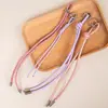 Cuerdas personalizadas para bolsitas, cordones de alta calidad para bolsitas, cordones de piel sintética, correas tejidas, colgantes con anillo de metal, venta al por mayor desde la fábrica de Hangzhou