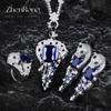 Conjunto de collar de leopardo con zafiro real de alta calidad, colgante de esmeralda, pendientes de diamantes azules, anillo de diamantes verdes