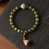 Hainan Semilla Dorada Cadena de Mano Grasa de Pollo Estrella Amarilla Luna Bodhi Madera de Durazno Flor de Loto Hombres y Mujeres Juego Cultural Pulsera de Cuentas Budistas Fabricante Mayorista