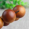 Pulsera de ciprés al por mayor de fábrica 2.0 material envejecido antiguo alto aceite pulsera de madera para hombres y mujeres cuentas de Buda Wen play cuentas de rosario joyería