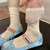 Calcetines de verano finos para mujer en color gris, hechos de algodón de Xinjiang, de longitud media hasta la pantorrilla, estilo Miu, inspirados en el ballet, con lunares, de rejilla, de encaje, calcetines apilados