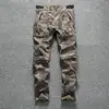 Pantalones de Trabajo Versátiles Casuales para Hombre de Nuevo Estilo Camuflaje Multibolsillo Juventud Corte Delgado Pantalones de Hombre Algodón Fabricante Mayorista