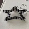 Pinza para el pelo de resina a cuadros versátil estilo coreano vintage negro Pinza para moño de gama alta Pinza de tiburón modelo nuevo