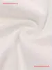 Camiseta de manga corta con cuello redondo y estampado de letras en la parte delantera