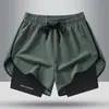 Venta al por mayor del fabricante Exportación transfronteriza Pantalones cortos de seda helada para hombre Verano Tres puntos Pantalones deportivos de playa Secado rápido Correr Fitness Entrenamiento