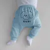 Ropa exterior holgada con estampado de dibujos animados unisex para niños, pantalones harén elegantes, pantalones nuevos 2026 con puños elásticos