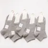 Calcetines de fábrica para mujer primavera y verano Calcetines tipo mocasín para mujer japonesa transpirables absorbentes de sudor desodorantes calcetines de color liso para mujer venta al por mayor
