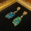 Bronce Antiguo Occidental Chapado 18k Oro Retro Viejo con Piedra Moteada de Imitación Diseño Asimétrico con Pedrería