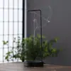 Venta caliente transfronteriza quemador de incienso Zen decoración interior del hogar quemador de incienso invertido quemador de incienso de línea creativa quemador de incienso se puede enviar en nombre de