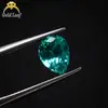 Anel de pedra preciosa artificial Wuzhou Paraíba nano em formato de gota de pera, superfície pontiaguda, pedra sem lapidação no fundo, preço de atacado direto da fábrica