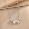 Colar de aço de titânio da moda estilo japonês-coreano feminino nicho de alta qualidade corrente de clavícula sem cor leve luxo all-match trevo de quatro folhas joias