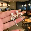 Suministro para puesto de mercado nocturno pendientes de pin de plata 925 perla estilo ins moda pendientes Joker pendientes de temperamento simple al por mayor