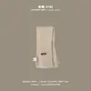 Bufanda Infantil Coreana Qiunan Modelo Nuevo de Invierno para Niños y Niñas Beige de Punto con Borlas Calentador de Cuello para Bebé Venta al por Mayor