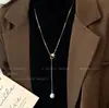 Colar Longo de Pingente de Pérola Dourada para Mulheres Outono e Inverno Elegante High-End Luxo Acessível Corrente de Suéter Retrô Ajustável Acessórios