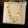 Moda Europea y Americana Serie Oceánica Estilo Playa Collar Cadena Cruzada Chapada en Oro Concha de Vieira Caracola Colgante Accesorios Cadena Clavicular