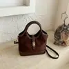 Bolsas de Lujo Ligero de Nicho para Mujer 2026 Nuevo Súper Caliente Retro Bolso Cubo de Uso Diario Bolso de Hombro Único Versátil Cruzado