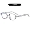 Nuevas Gafas de Marco Ovalado Retro para Mujer Personalidad Artística Lentes Planos Simples Decoración de Remaches Clásica Montura de Espejo Lisa