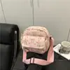 2025 Nueva Bolsa de Lona Rayada de Pana para Mujer Bolso Cruzado Ligero Casual con Estampado de Moño de Moda Bolso de Hombro