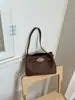 Bolso bandolera de estilo coreano con cierre simple de broche, versátil y elegante para ir al trabajo, bolso de nicho de moda de alta gama Kelly