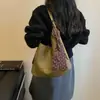 2026 Bolsa Versátil Retro Nova para o Dia a Dia Feminina de Ombro Único Elegante Tecida Grande Capacidade Moda Simples Tote