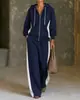 Colección de otoño e invierno 2026 para mujer, transfronteriza, europea y americana: Sudadera con capucha y cremallera de bloques de color y pantalones de pierna ancha, un conjunto informal y deportivo de dos piezas