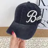 Gorra de béisbol de mezclilla lavada con estampado de leopardo vintage de moda bordada con letras para mujeres y hombres, versátil y estiliza el rostro