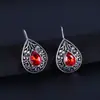 Deseo Venta Caliente de Amazon Nuevos Pendientes Vintage con Forma de Gota de Agua y Pera Pendientes Europeos y Americanos de Plata Tallada con Rubí