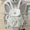 Mochila a rayas de alta moda al por mayor para estudiantes universitarias, adecuada para ir al trabajo y uso casual, mochila pequeña para actividades al aire libre, fresca y elegante
