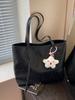 Bolso de gran capacidad de comercio exterior para mujer, primavera y verano 2025, nuevo bolso de hombro portátil a juego, bolso de mano de clase para ir al trabajo.