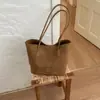 Nuevo bolso de hombro casual de moda de gran capacidad para mujer de Shuai Mi, bolso de mano vintage de color sólido único para madre e hija