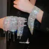 Pulseira Redonda Europeia e Americana Transfronteiriça com Borla e Cravejada de Diamantes, Pulseira Minimalista Moderna de Estilo Nicho com Design Único, Joia de Mão de Nicho