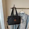 Bolsa tote casual feminina, bolsa de ombro e transversal de grande capacidade, nova bolsa de mão versátil da moda 2026 para escola e trabalho