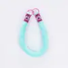 Color nuevo bolsa de peluche para niña dopamina colgante para teléfono móvil moda personalidad anti-pérdida práctica combinación de colores linda
