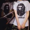 Camiseta Unisex Casual Holgada de Manga Corta con Estampado de Camuflaje Clásico Flor de Cerezo Monte Fuji de Marca de Moda Pe