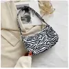Bolsa de Ombro Única Color Block Tendência Venda Quente Personalizada Feminina 2025 Novo Estilo Coreano Estampa de Personalidade Bolsa de Axila Moda Estampa de Leopardo